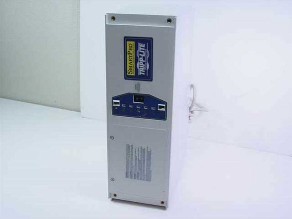 Tripp-Lite Smart 700RM SM3207 UPS — front panel view showing SmartPro and Tripp-Lite branding, status indicator LEDs, and control interface
