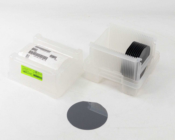 SEH America 100mm polished silicon wafers – lot of 10 in plastic wafer carrier with one wafer displayed flat in foreground