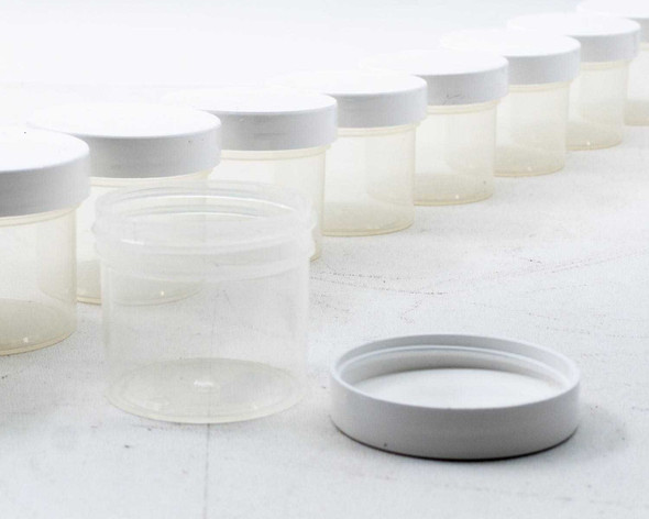 Parkway Plastics A0530200PPC clarified polypropylene 2oz jars with white screw-on lids arranged in a row, one jar open in foreground