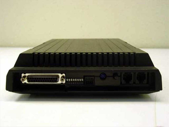 Microcom AX/2400C external modem – rear panel showing DB25 RS-232 serial port, RJ11 phone jacks, and power connector