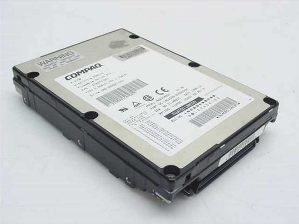Fujitsu MAB3045SC 4.3GB 80-Pin SCSI hard drive top view with Compaq label and WARNING sticker