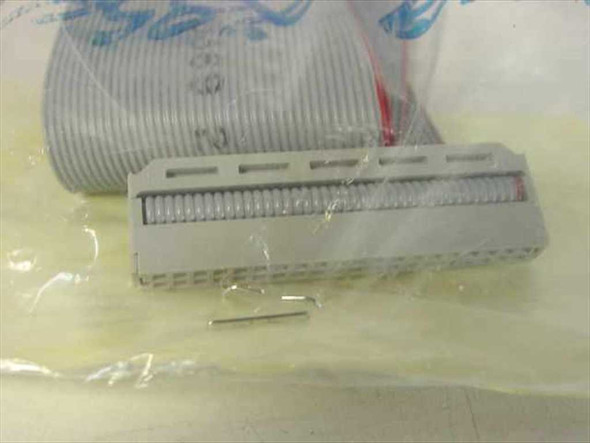 Ultratech Stepper 0509-285400 cable extension connector end and small pin detail visible inside bag