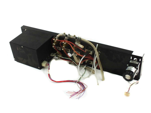 Atcor CRD-1410-DF controller rear/underside view showing fluid tubing, solenoid valves, wiring harness, and Oriental Motor assembly