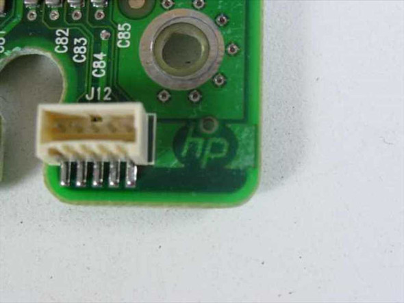 HP logo visible on reverse side of C6417-60055 logic board with J12 connector detail