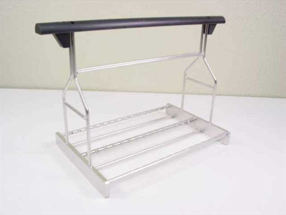 Applied Magnetics Wafer Block Carton Carrier – front three-quarter view showing aluminum wire frame base, angled support arms, and black rubber-grip handle bar