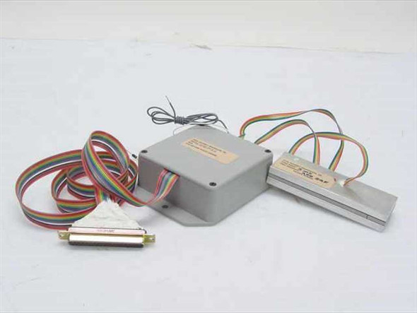 Total Accuracy Transducers LUSL load cell system — signal conditioning enclosure, miniature beam load cell, and DB25 rainbow ribbon cable laid out together