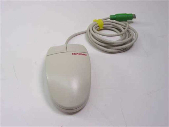 Compaq M-S34 PS/2 ball mouse front and left side view showing Compaq logo and full cable with green PS/2 connector