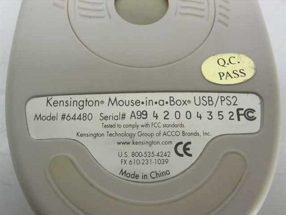 Kensington 64480 Mouse-in-a-Box bottom label showing model number 64480, serial number, USB/PS2 designation, FCC/CE marks, and QC Pass sticker