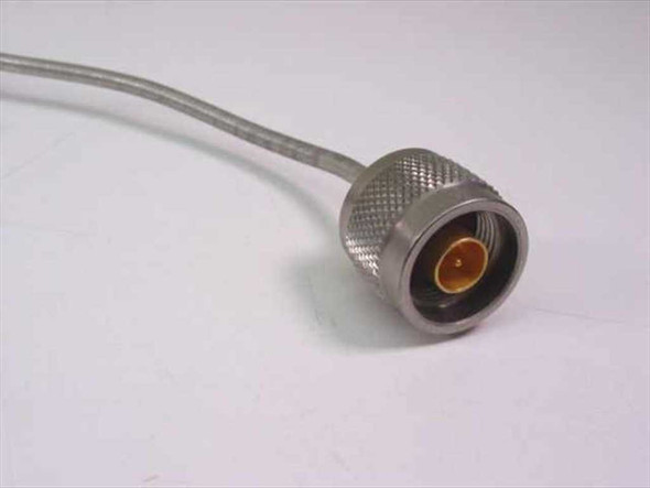 KMW 200580-001 RF cable close-up of N-type male connector end with knurled coupling nut and gold center pin