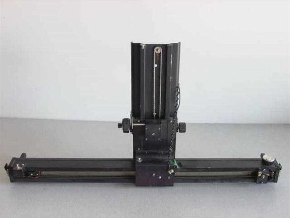 Custom optical apparatus — front view with lens housing raised and linear rail fully visible
