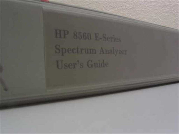 HP 8560 E-Series Spectrum Analyzer User's Guide binder spine showing printed title label