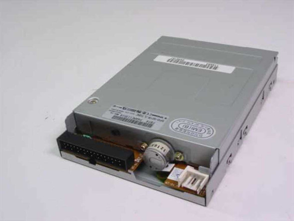 Samsung SFD-321B floppy drive rear view displaying 4-pin Mini Berg power connector and internal components