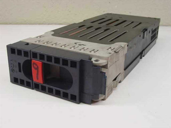 IBM 88G8199 SSA hard drive caddy front view showing black plastic housing and locking handle with red label marked '9'
