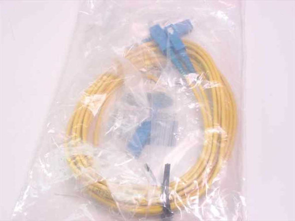Belkin F2F80277-10 yellow fiber optic patch cable with blue SC duplex connectors laid out inside bag