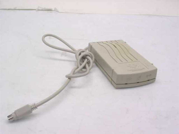 Global Village TelePort 56 Fax/Modem A824 – top and right-side view showing attached mini-DIN 8-pin serial cable