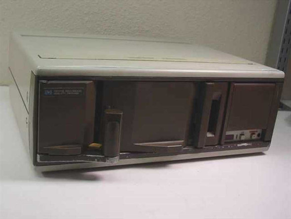 HP 78571B Recorder – front right three-quarter view showing beige housing, chart paper slot, and two drive bays