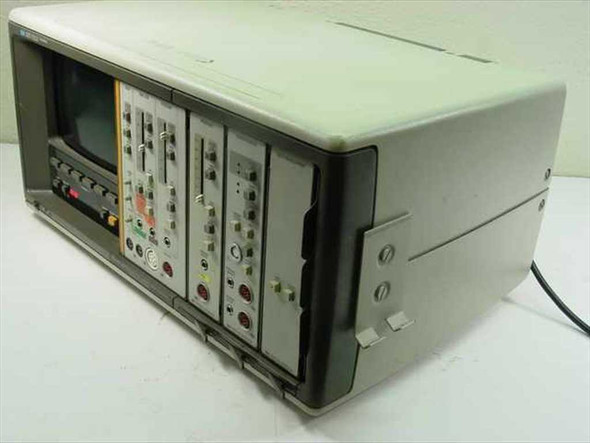 HP 78534C Monitor Terminal — front three-quarter view showing plug-in module bays, CRT display, and beige enclosure