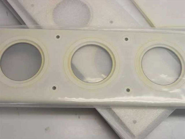 MEC Tech AMAT 8330 Flame Spray Tray close-up — three circular cutout openings and mounting holes visible on white ceramic-coated tray