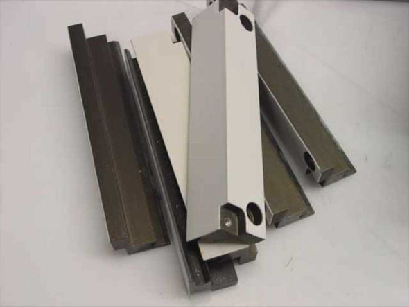 MEC Tech AMAT guide rail components — multiple anodized aluminum extrusion rails and a white bracket piece