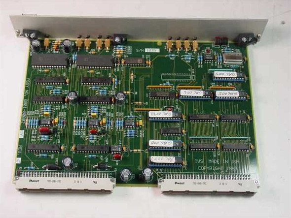 IVS Accuvision 200 SFB Board 0001-00002 — top-side view showing full PCB layout with ICs, capacitors, yellow edge connectors, and serial number label