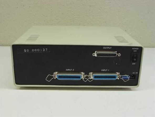 Belkin Auto Switch Plus — rear panel showing one DB25 output port, two DB25 input ports labeled Input 1 and Input 2, power on/off switch, and AC power inlet