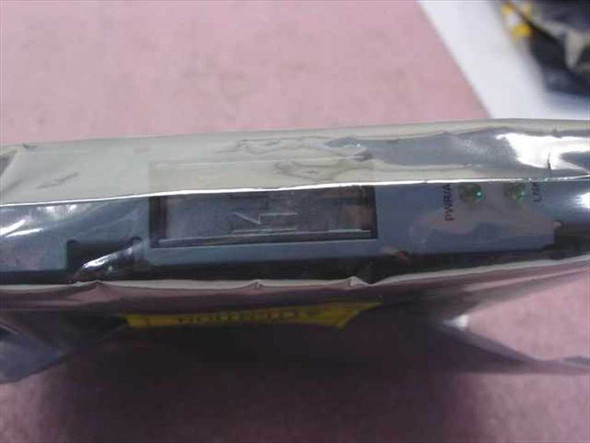 HP 5064-6365 HBA card in anti-static bag, edge-on view showing PCI card bracket and connector slot