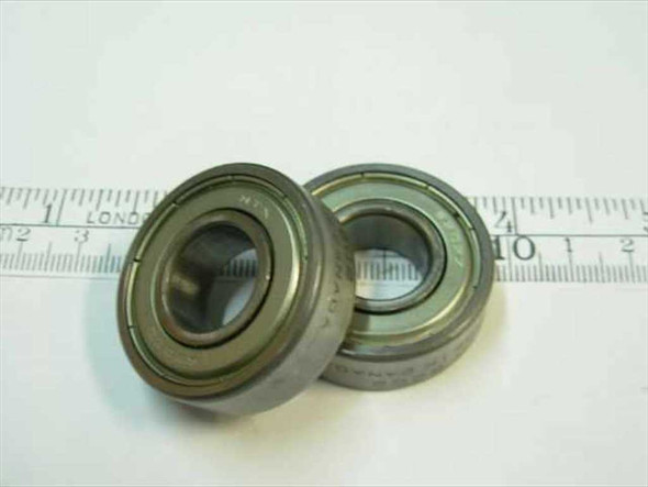 6202-2Z shielded steel ball bearings shown next to ruler scale — top view showing two bearings side by side