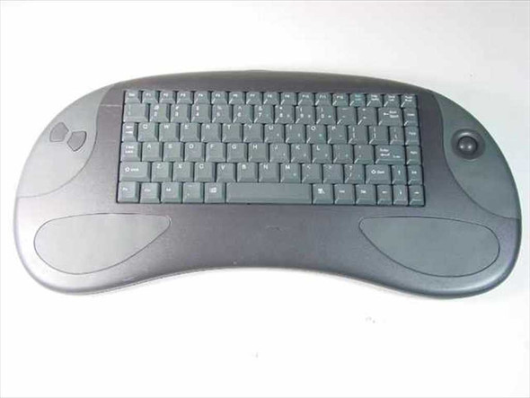 Sejin SWK-8697WT wireless keyboard with integrated trackball — top view showing full key layout and ergonomic curved body