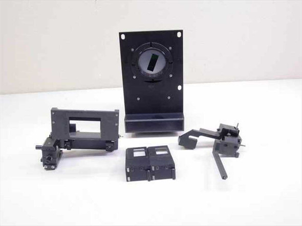Ultratech Stepper 04-17-00190 alignment cell — full set of subcomponent assemblies laid out on white surface