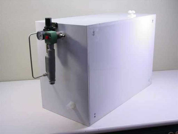 Chemical resistant container right side view showing mounted pressure regulator with analog gauge and green solenoid valve assembly