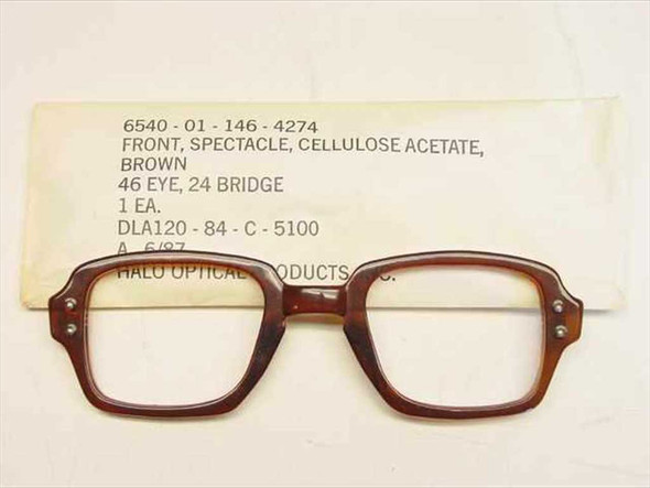 USS 6540-01-146-4274 military spectacle front, brown cellulose acetate horn-rim frame, shown with original DLA contract sleeve label