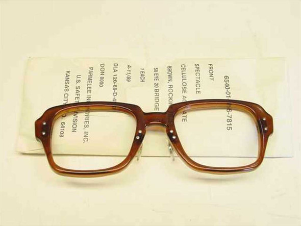 USS 6540-01-146-7815 military BCG spectacle frame front view, brown cellulose acetate, shown with original packaging sleeve and specification label