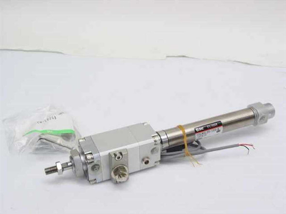 SMC CDLM2L20-100-E-H7A1S pneumatic linear actuator cylinder — full assembly with accessory bag, left-side view