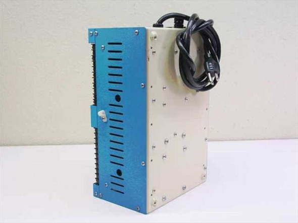 Anaheim Automation DPQ21SB1 servo driver pack – left side view showing ventilation slots on blue panel and AC power cord routing on beige rear panel