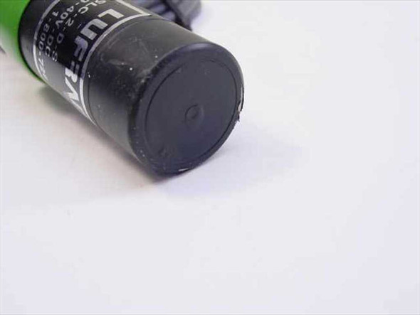 LUFRAD SLC-2-D-S proximity switch sensing face close-up showing black cylindrical tip with small center sensing point