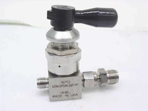 Parker 4Z-A-DPQ4K-SSP-PP stainless steel ball valve – front-left view showing body label: 16PD, 4Z(A)-DPQ4K-SSP-PP, IAWL, Made in USA, with SSP tube fittings and black toggle handle