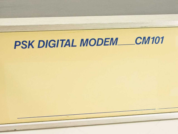 ComStream CM101 front panel close-up showing PSK Digital Modem model name label