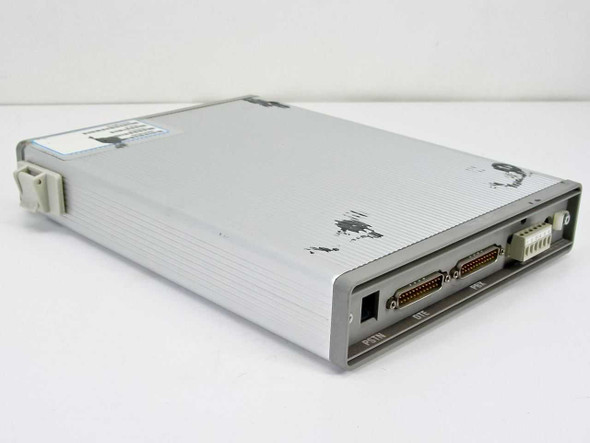TSB International CC3-6-2400-NA external modem – rear angled view showing DB25 connectors and 6-position terminal block, with paint chips on housing