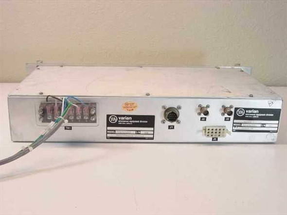 Varian VJC6767D8T7 Switch Control – rear panel view showing Varian Microwave Equipment Division labels, multi-pin connectors, and wiring harness
