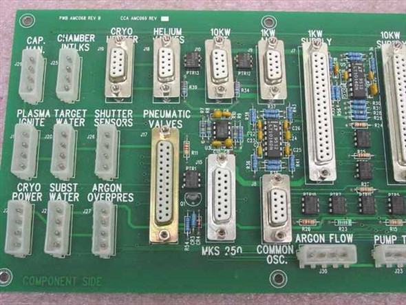 AMC068 AMC069 controller card component side close-up showing silkscreen labels: Chamber Intlks, Cryo Heater, Helium Valve, Plasma Ignite, Target Water, Shutter Sensors, Pneumatic Valves, MKS 250, Argon Flow, 10KW Supply