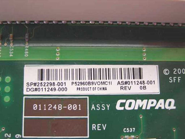 Compaq 252298-001 riser board label close-up showing SP# 252298-001, AS# 011248-001, Rev 0B, and Product of China markings