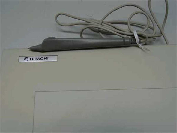 Hitachi HDG-1212D ComGraph Tablet Digitizer – close-up of Hitachi logo label on front edge with stylus