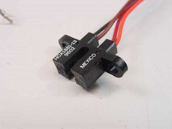 Honeywell HOA1881-13 optoswitch sensor body close-up showing model number label and Mexico origin marking, date code 9602