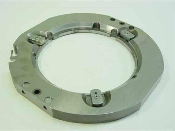 Stainless steel tick mark flange top view showing OD 8.75" ring with four alignment clip assemblies and bolt holes