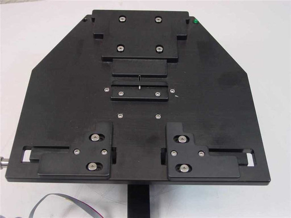 6-Position Logic Driven Pedestal Cassette Tray top-down view showing linear slide rail mechanism, adjustable mounting brackets, and green LED indicator at corner