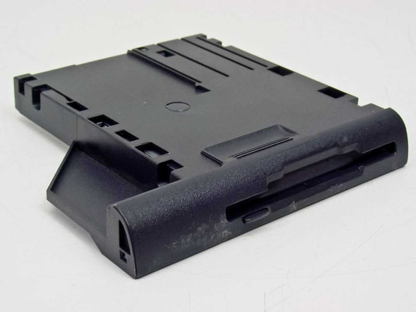 Dell 09YXE floppy disk drive module – top/front angled view showing drive slot and plastic bay housing