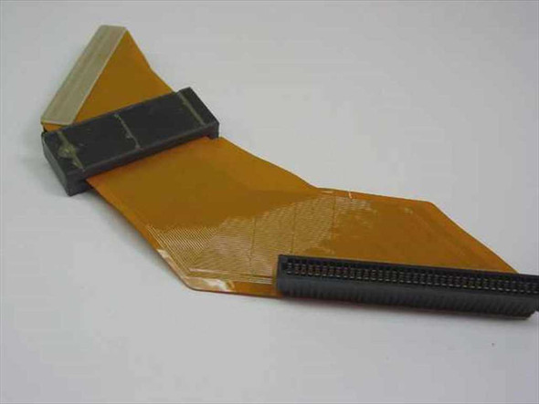 IBM 27F4603 PS/2 hard drive ribbon cable showing flat flexible cable body with two connectors visible from above