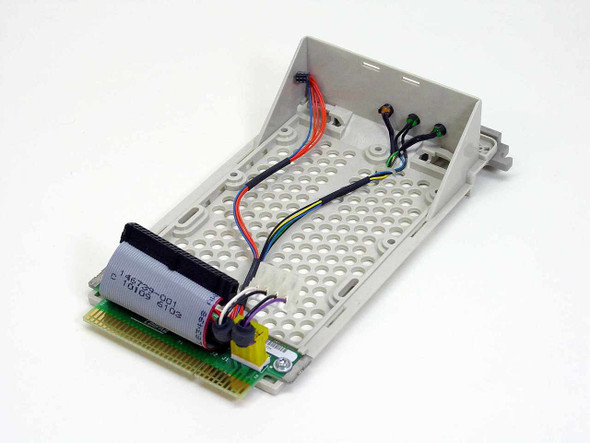 Compaq 146763-001 SCSI drive caddy — side angled view showing caddy frame, PCB board, and internal wiring harness