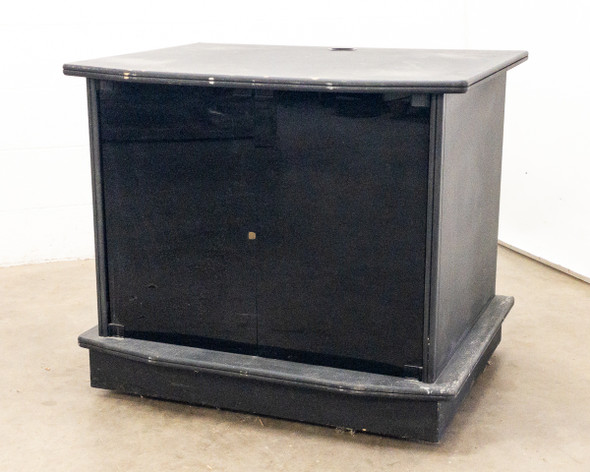 Multimedia TV cabinet with black glass doors closed – front left three-quarter view showing glossy black finish and plinth base