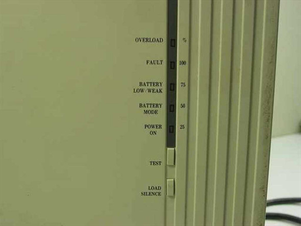 Minuteman PML2000 UPS front panel close-up showing Overload, Fault, Battery Low/Weak, Battery Mode, Power On LED indicators plus TEST and LOAD SILENCE buttons
